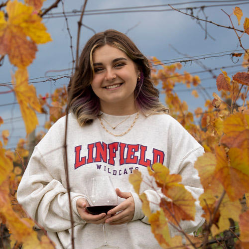 portrait of Emma Libby '23 at a winery