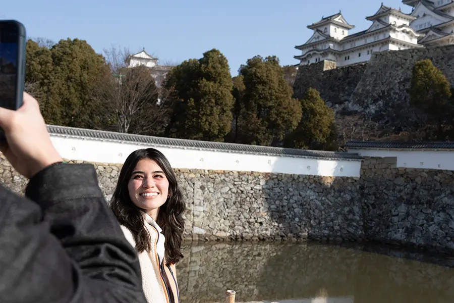 Emma posing in front of Himeji Castle in the town of Himeji. 