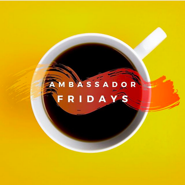 A cup of coffee with the words "Ambassador Fridays."