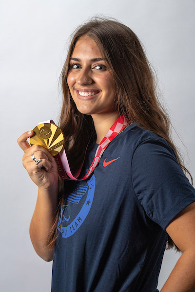 Annie Flood '25 wearing her gold medal