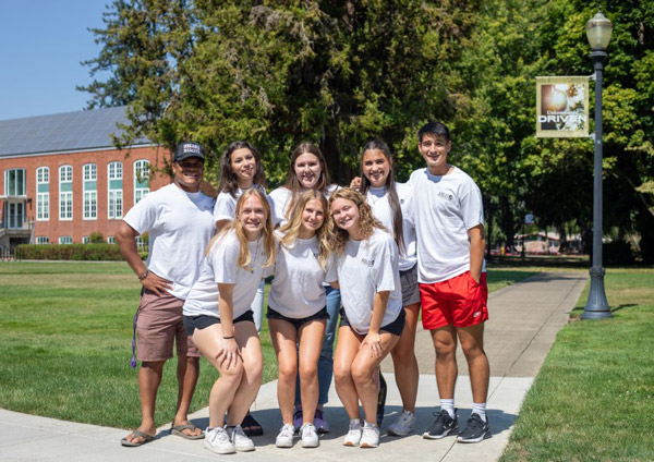 Nine members of the 2023-24 ASLU leadership team in the academic quad.