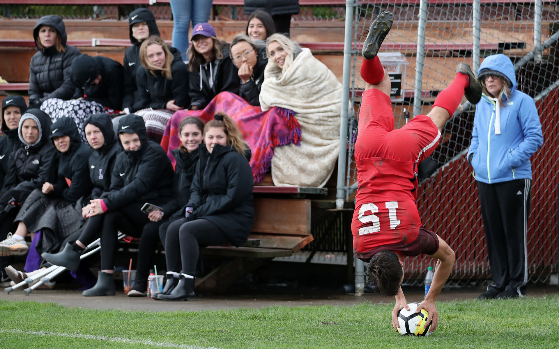 man doing a soccer flip-throw