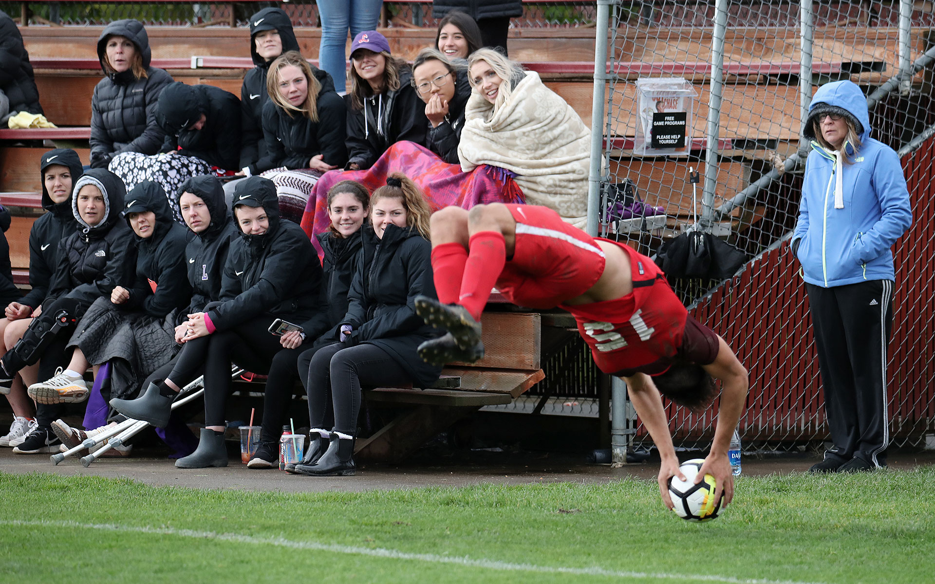 man doing a soccer flip-throw