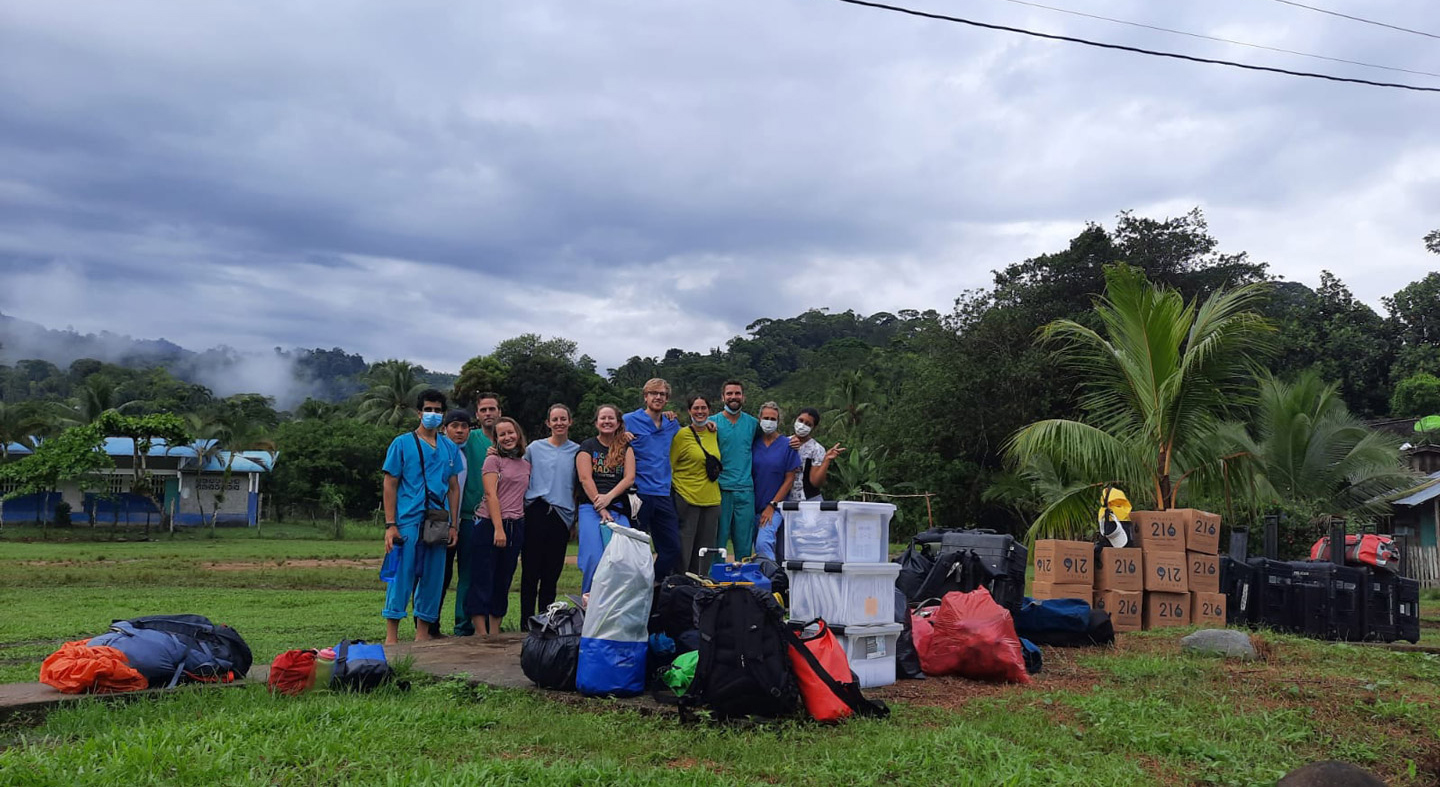 Cassandra pictured with the Floating Doctors team of volunteers surrounded by the lush landscape in Panama