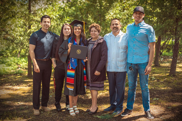 Jessenya with her family after her Linfield graduation.