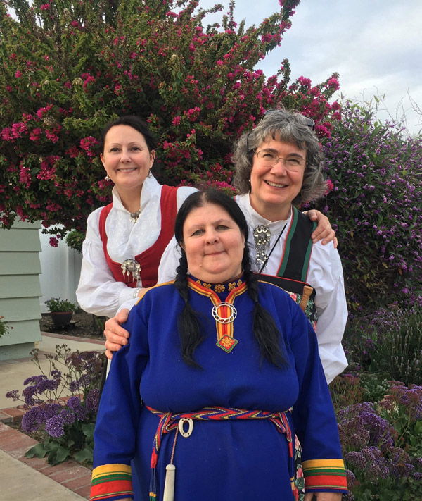 Joan Paddock and friends in national dress.