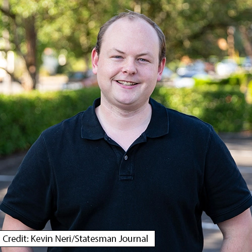headshot of Jonathan. Credit to Kevin Neri/Statesman Journal.