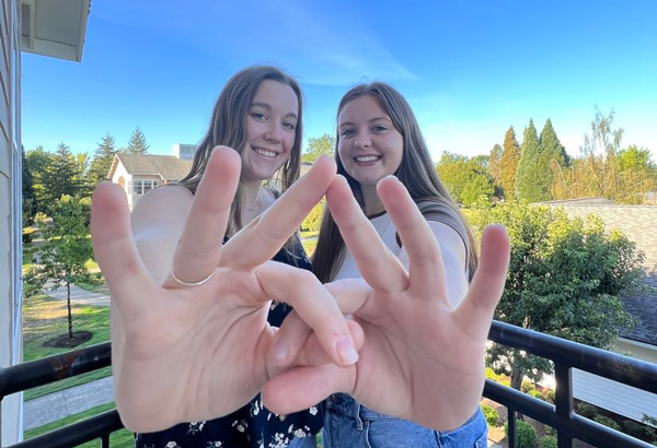 Meghan Mullaly '23 posing with fellow Zeta Tau Alpha sorority member.