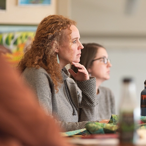 graduate students studying together in a classroom