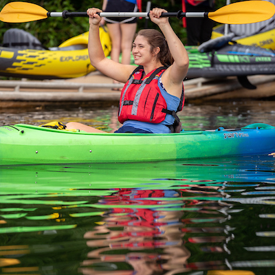student kayaking