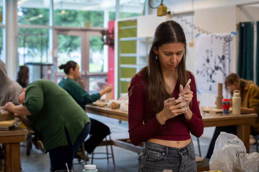 Art students working in the sculpture studio.