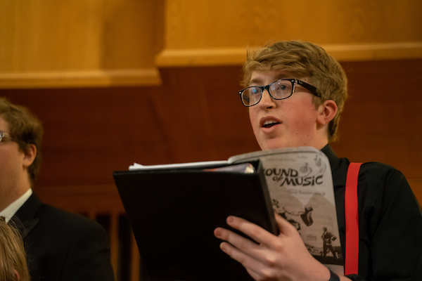 student performing at a Linfield choir recital