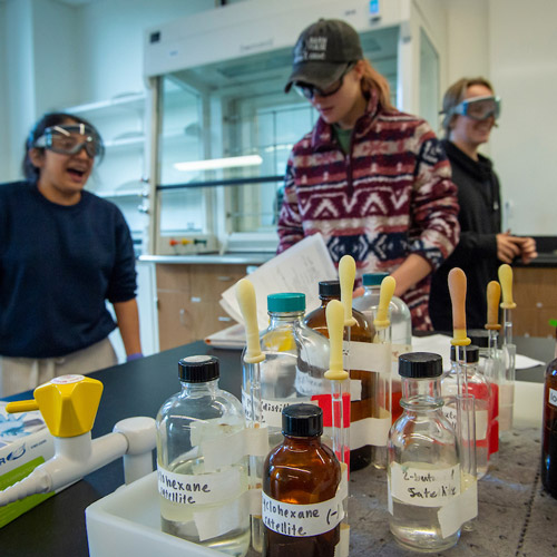 Three students working in the organic chemistry lab.