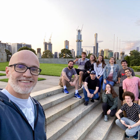 Professor Dunn with students in Australia