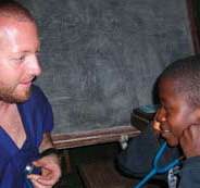 Male nurse with young patient