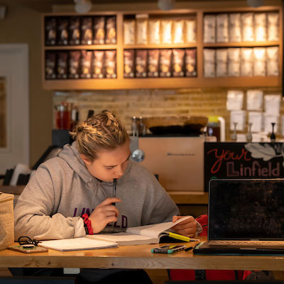 student studying in Starbucks