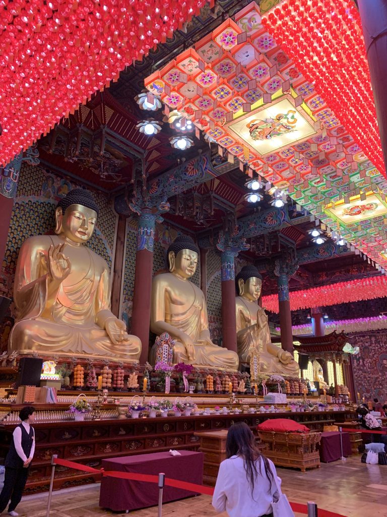 Three Buddha statues