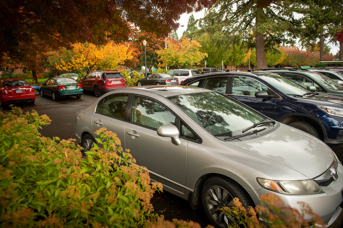 Cars parked in a McMinnville campus parking lot