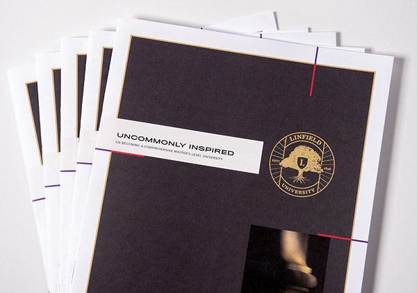 A stack of Linfield's new strategic plan documents.