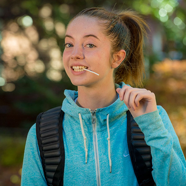 female student heading to class