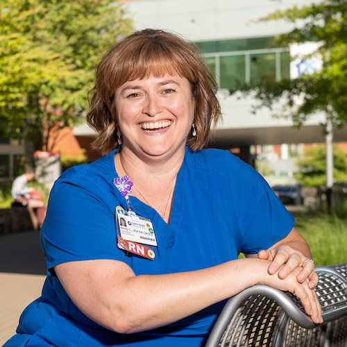 female nurse in scrubs at hospital