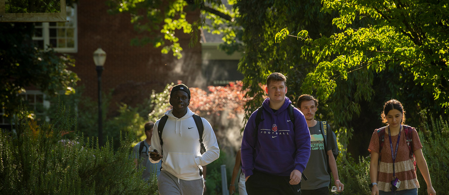 students walking through the academic quad