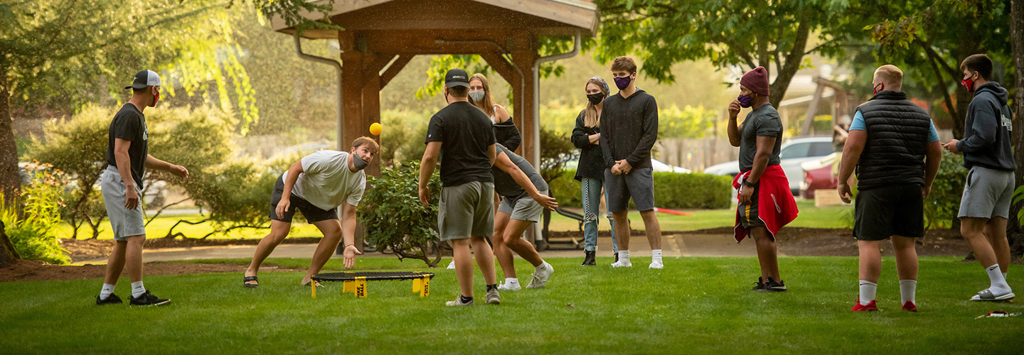 students playing a game on the IM field during the 2020 orientation