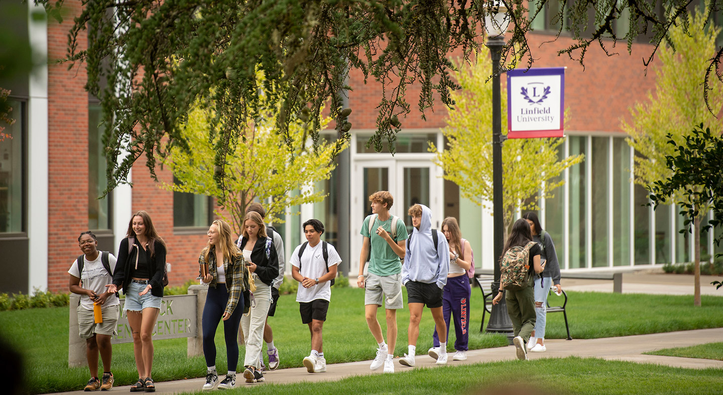 Students walking to class through the academic quad on the first day of fall semester.