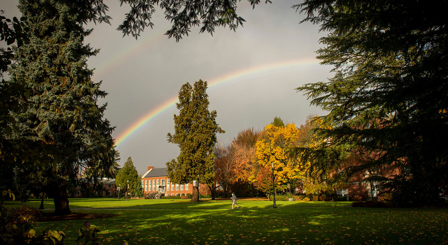 A rainbow above TJ Day Hall on the Linfield University McMinnville Campus
