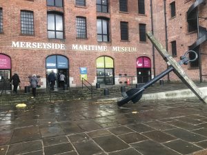 An anchor and the entrance to the Merseyside Maritime Museum