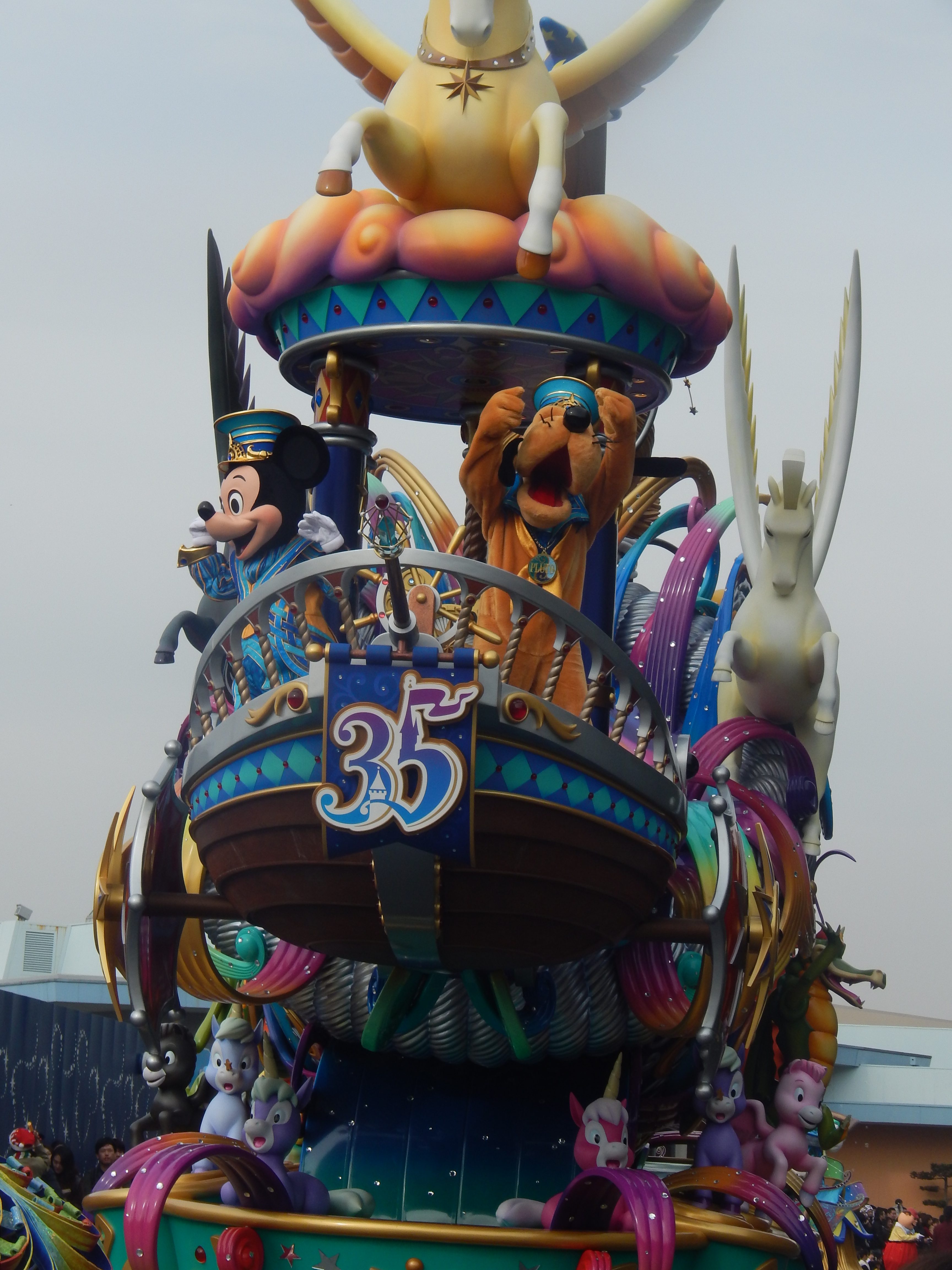 Mickey Mouse and Pluto in a parade