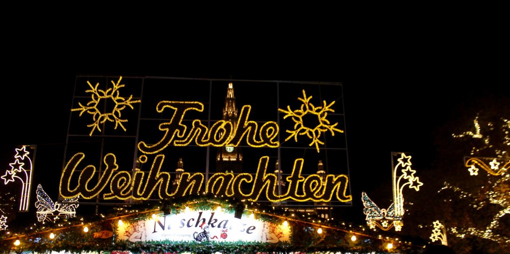  "Frohe Weihnachten." (Merry Christmas) in lights.