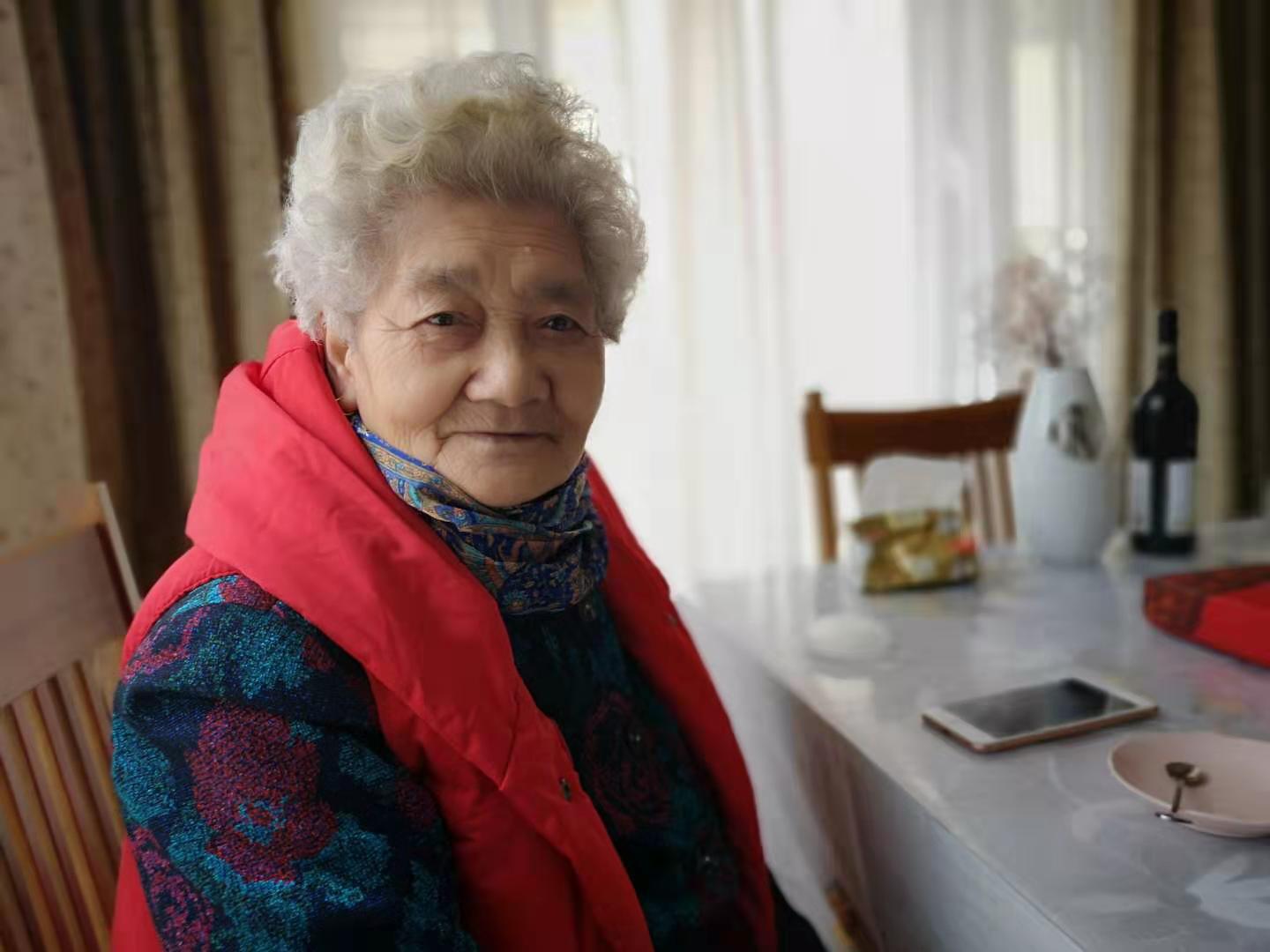 My Host Grandmother at the Dinner Table, Jizhou, China