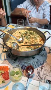 A large pan on a table with Austrian Spätzle, also know as Austrian mac and cheese