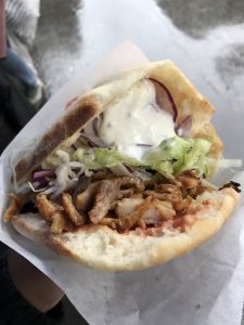 Döner kebab, a pita filled with meat, lettuce, onions, and sauces