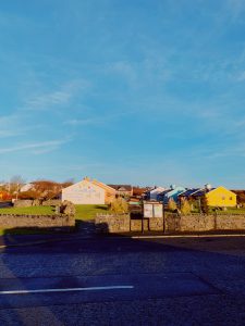 Village of Spiddal with blue skies