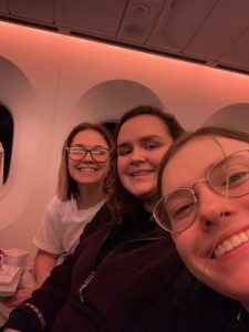 McKenna, Me, and Grace on our flight to Auckland