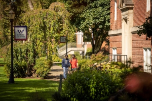 Students walk on Linfield University McMinnville Campus